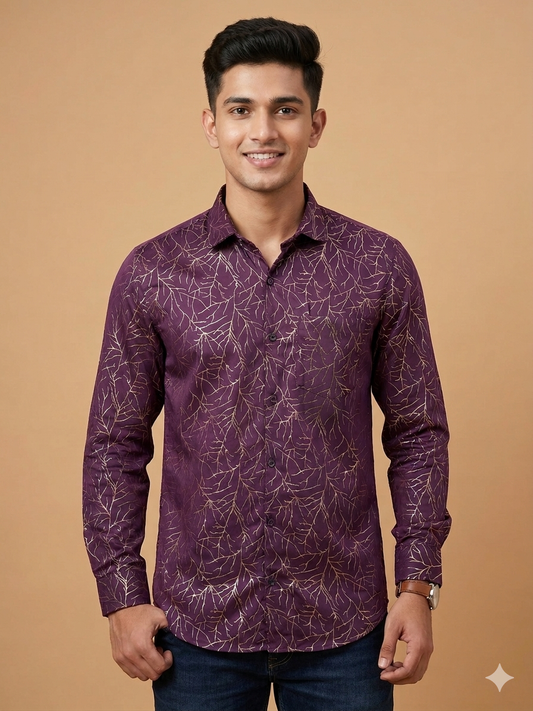 Man wearing a purple patterned SATIN shirt against a beige background